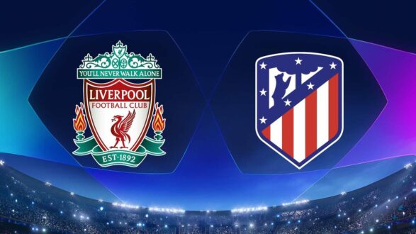 لاعبو ليفربول وأتلتيكو مدريد يتنافسون على الكرة في مباراة بدوري أبطال أوروبا