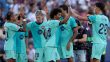 لاعبو برشلونة يحتفلون بهدف خلال مباراة في الدوري الإسباني